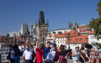 Western bridge towers of Charles Bridge with Prague Castle in the background