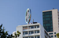 Typical Berlin revolving sign: Bayer