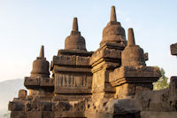 Small stupas, panels and carvings in the sun