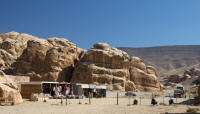 Entrance to Little Petra site, with souvenir shops (and a camel)