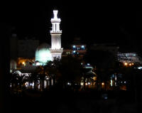 Al-Sharif Al-Hussein bin Ali mosque at night from the Royal Yacht Club