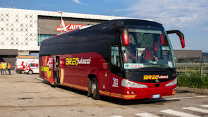 Tour coach at autostrada service station near Soave