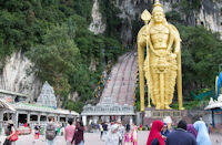 Statue of Murugan and the 272 steps leading up to the Temple Cave