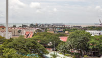 Tower of Menara Taming Sari, bridge over Malacca River, and sea