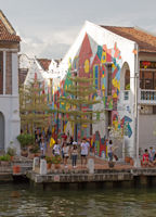 Art on building beside the Malacca River
