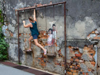 &ldquo;Brother and Sister on a Swing&rdquo; on Lebuh Chulia