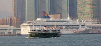 Star ferry and cruise ship near Tsim Sha Tsui