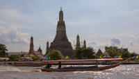 Wat Arun and longtail boat