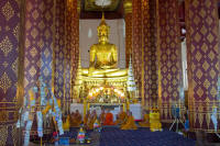 Buddha in royal attire and monks