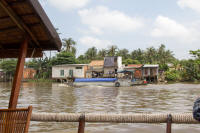 Houses and passing boat