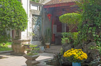 Tiger carving guarding the temple