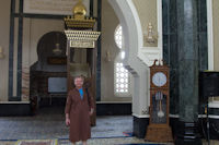 Infidel in the mosque, with inaccurate clock
