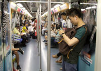 What passengers do on MRT trains