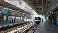 Skytrain train approaching Chit Lom station